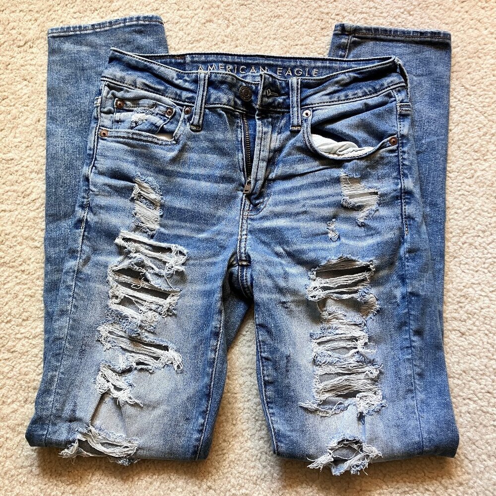 American Eagle Airflex light wash distressed ripped skinny jeans